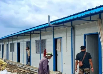 Work in progress for the construction of over 3000 semi-permanent prefabricated houses in Manipur