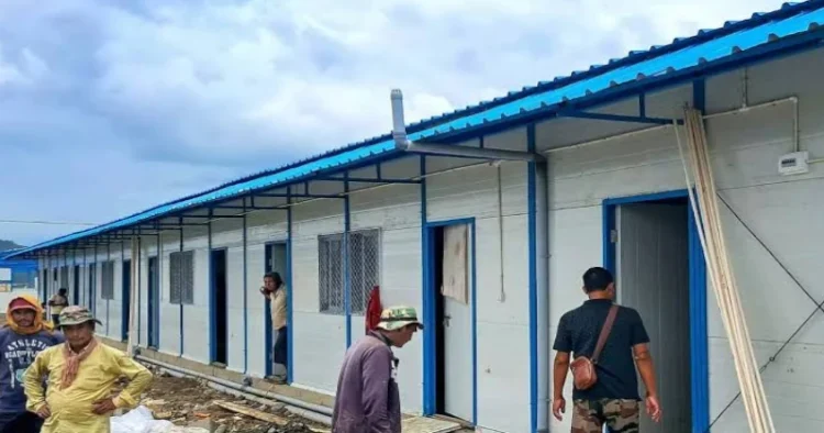 Work in progress  for the construction of over 3000 semi-permanent prefabricated houses in Manipur