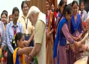 Prime Minister Narendra Modi with school girls on account of Raksha Bandhan