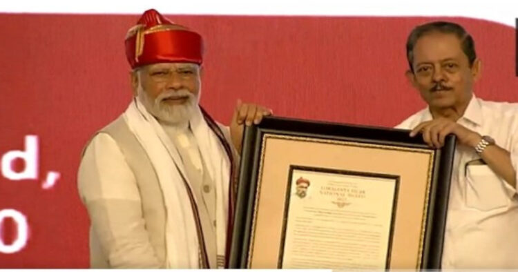 PM Modi receiving the Lok Manya Tilak Award