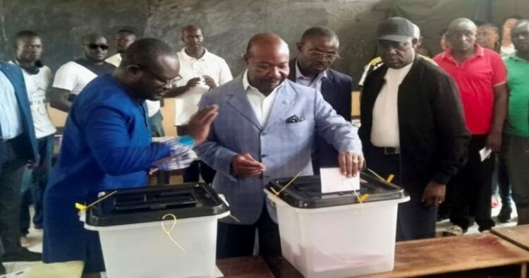 Gabonese President Ali Bongo Ondimba casts his vote at a polling station during the presidential election in Libreville