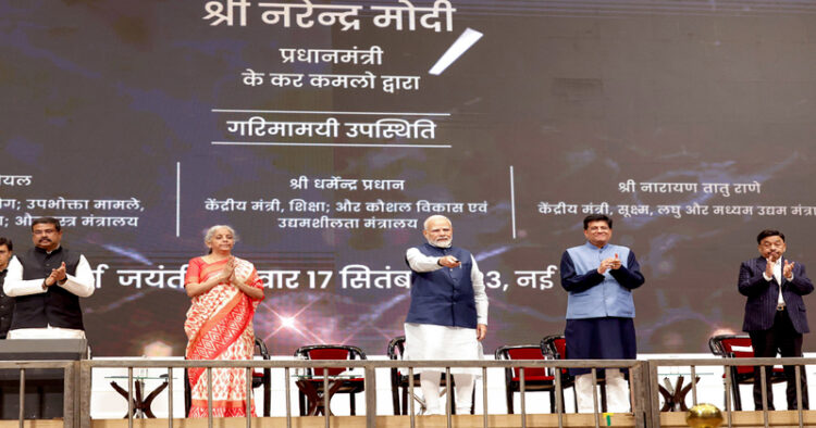 Prime Minister Narendra Modi launches the 'PM Vishwakarma' scheme, as Union Ministers Dharmendra Pradhan, Nirmala Sitharaman, Piyush Goyal and other dignitaries look on, at the India International Convention and Expo Centre, Dwarka, in New Delhi on Sunday. (ANI Photo)