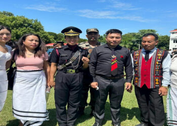 Senior Under Officer CH Enoni poses for a picture with his family after the passing out parade of 197 cadets on the Parameswaran Drill Square at the Officer's Training Academy, in Chennai on Saturday. (ANI Photo)