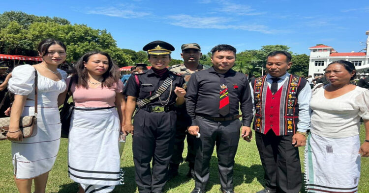 Senior Under Officer CH Enoni poses for a picture with his family after the passing out parade of 197 cadets on the Parameswaran Drill Square at the Officer's Training Academy, in Chennai on Saturday. (ANI Photo)