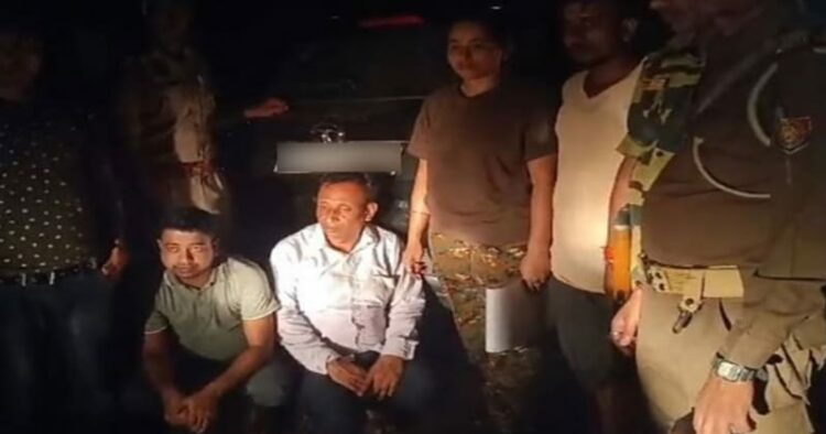 Assam Police officials with arrested accused