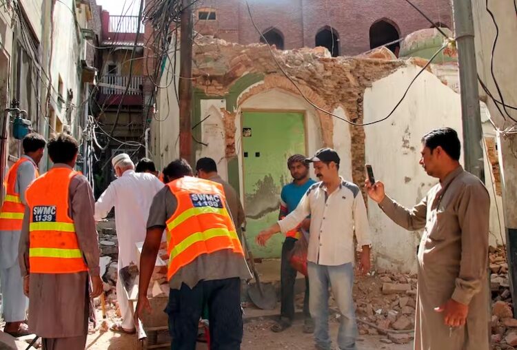 An old picture clicked in August 2018, when an Ahmadiyya mosque was demolished in Pakistan (The Conversation)