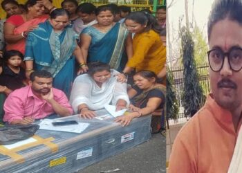 Relatives and family members of with the coffin of the deceased Asst Prof Samir Kumar