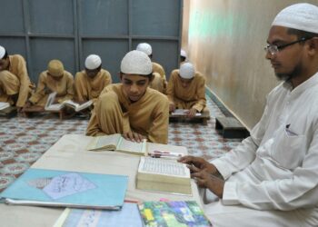 A representation image showing students studying at a Madrasa (Source: Scroll)