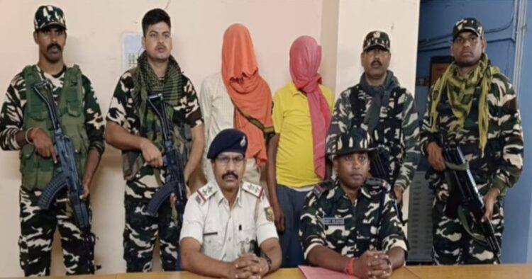 Security personnel with arrested Maoist cadres, Shankar and Krishna Yadav, courtesy : X