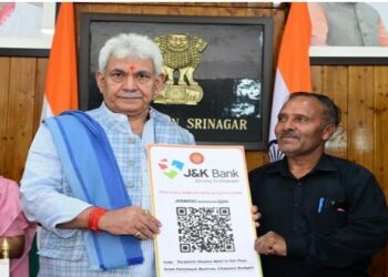 J-K: LG Manoj Sinha hands over land allotment orders to beneficiaries of PMAY-G