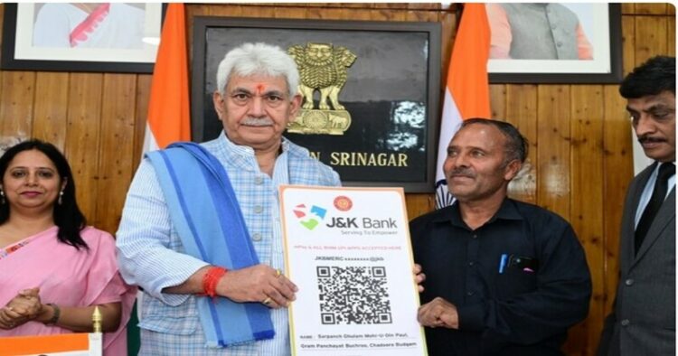 J-K: LG Manoj Sinha hands over land allotment orders to beneficiaries of PMAY-G