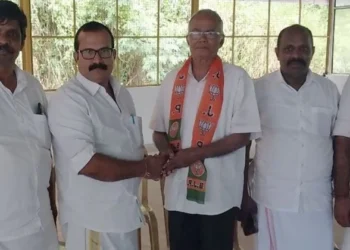 Fr Kuriakose Mattam of the Syro-Malabar church, with BJP members