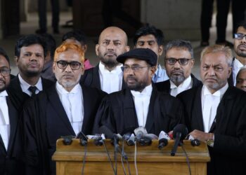 Bangladesh’s largest Islamist party Jamaat-e-Islami’s lawyer Matiur Rahman Akanda, addresses journalists in Dhaka