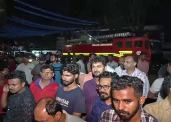 People at the site after four students died and several were injured in a stampede at CUSAT University, in Kochi