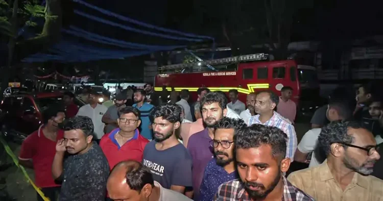People at the site after four students died and several were injured in a stampede at CUSAT University, in Kochi