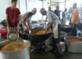 Workers preparing Laddu and Chidva