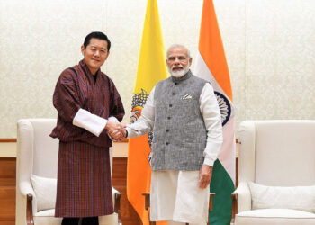 Left: King Jigme Wangchuck (Bhutan), Right: PM Modi (India)
