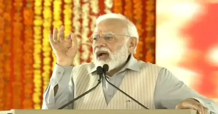 PM Narendra Modi addressing an election rally in Karimnagar