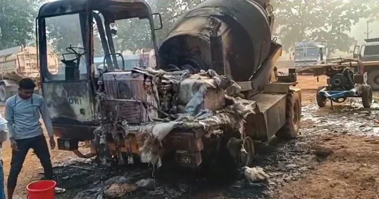 Wreckage of vehicles and machines, that were engaged in construction works, after Naxalites set them on fire, in Chhattisgarh’s Dantewada district (Source: PTI)