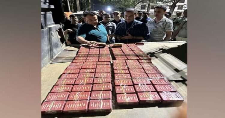 Assam police with the seized heroin