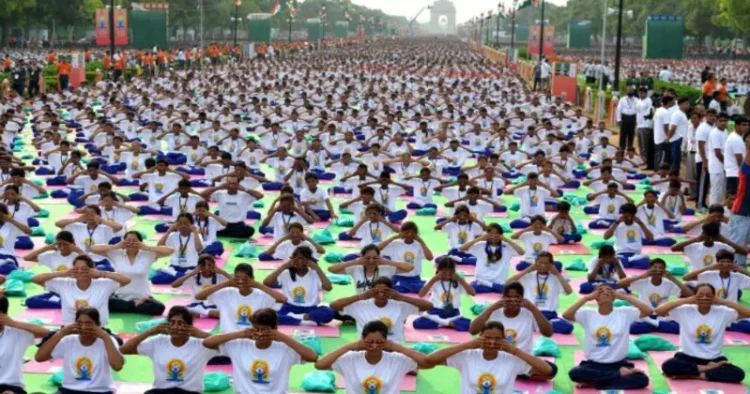 Yoga being practised by a large number of people