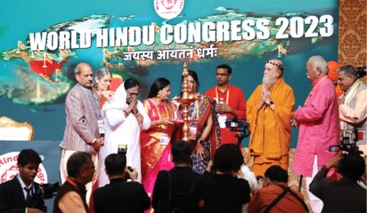 Mata Amritanandamayi, RSS Sarsanghchalak Dr Mohan Bhagwat, RSS Sarkaryavah Dattatreya Hosabale, Publisher  of Hinduism Today Satguru Bodhinatha and  Chairman of WHC Organising Committee Susheel Saraff inaugurating World Hindu Congress 2023 (From L to R)