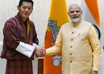 Left: Bhutan King Jigme Khesar Wangchuk, Right: PM Modi (India)