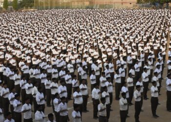 A representation image featuring Swayamsevaks during a meeting (Desh Gujarat)