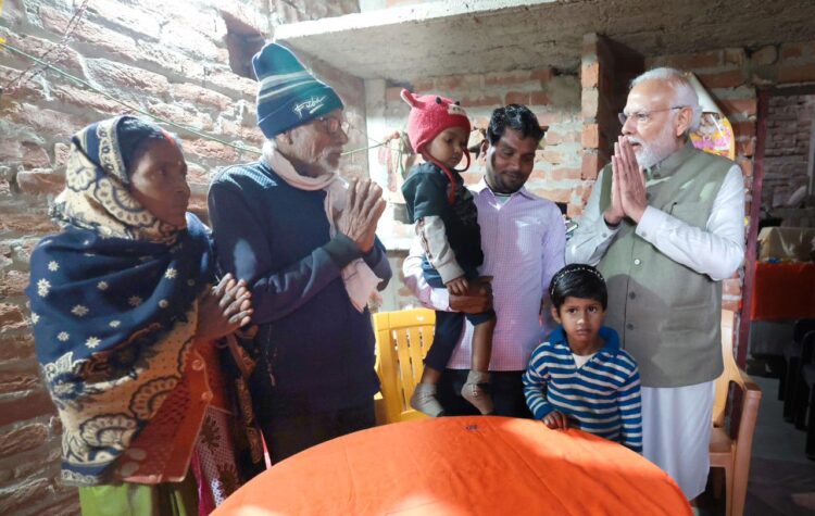 Prime Minister Narendra Modi at Mera Manjhi's house (X)