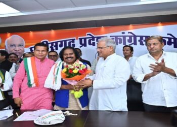 Nand Kumar Sai with former CM Bhupesh Baghel, image courtsey: IBC24