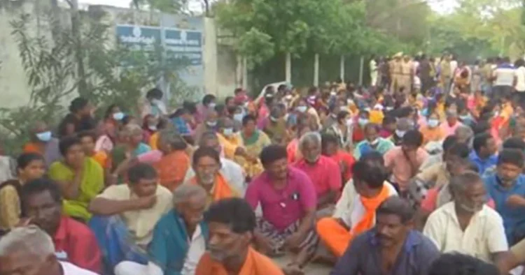 People hold protest after an ammonia gas leak was detected in a sub-sea pipe in Ennore, Tamil Nadu