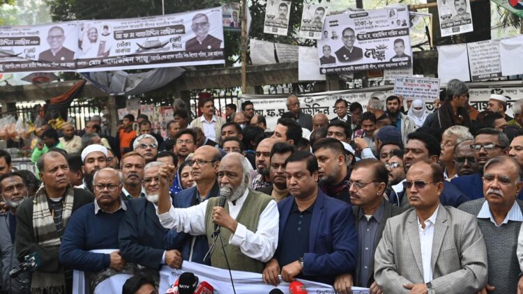 Dr. Abdul Moin Khan, senior leader of the Bangladesh Nationalist Party, addresses a protest rally in Dhaka, advocating for a free and fair election under a caretaker government (The Hindu, AFP)