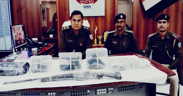 Police officials with weapons and ammunition seized from the Maoist, Curtsey: Jharkhand police via X