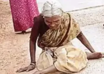 Girijamma, a physically challenged woman, crawls to the post office to get her pension