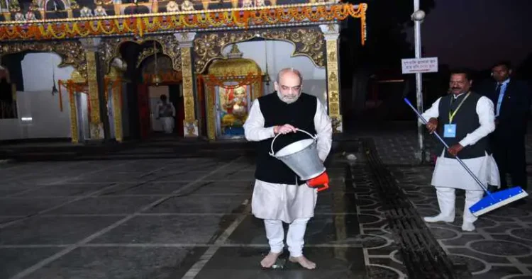 Union Minister of Home Affairs Amit Shah takes part in cleanliness drive at  Maha Bhairav Mandir
