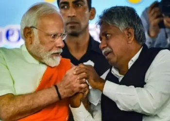 (Left)PM Narendra Modi (Right) Manda Krishna Madiga