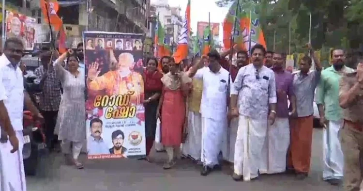 BJP protest against Thrissur Municipal Corporation’s step of removing the party’s flex boards erected in connection with PM Modi’s visit to the city
