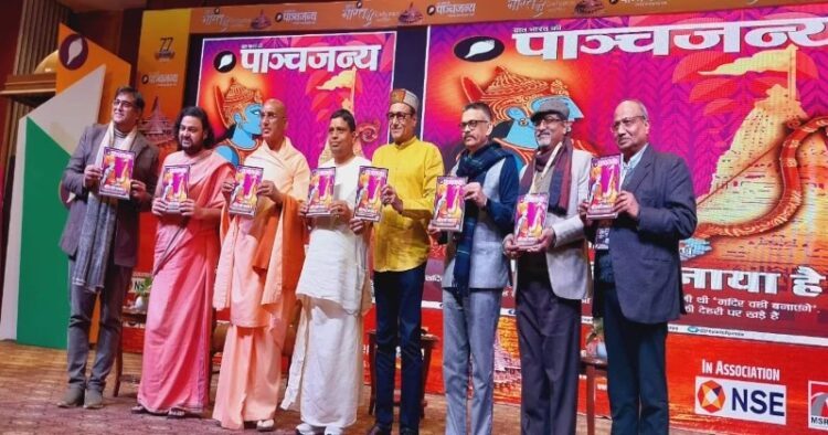 (From Left To Right) Hitesh Shankar, Swami Dipankar,  Swami Avadheshanand Giri Ji, Acharya Balkrishna, Nitish Bharadwaj, Prafulla Ketkar, Braj Bihari, Atul Goyal release the specail edition of Panchjanya on Ayodhya Ram Mandir