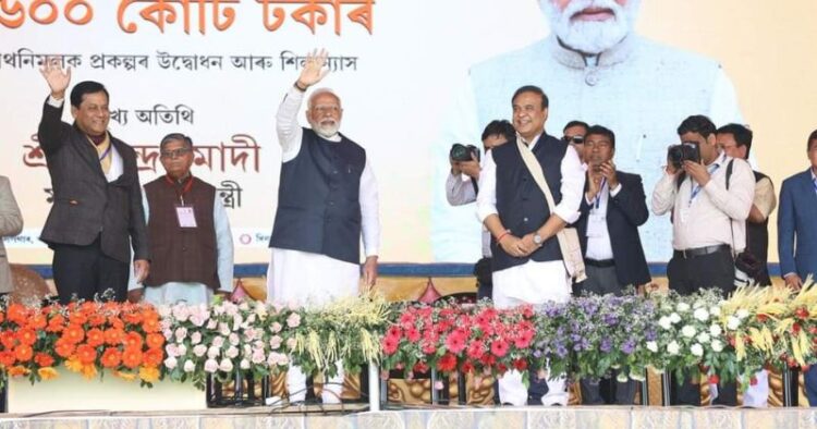 PM Narendra Modi along with Union Minister Sonowal and Assam CM Himanta Biswa Sarma