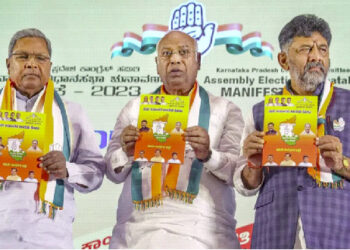 A file photo of Congress President Mallikarjun Kharge with Karnataka Congress President DK Shivakumar and senior party leader Siddaramaiah releases the party’s manifesto