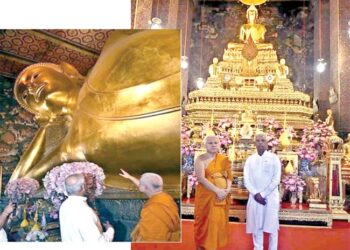 (Right) Bihar Governor Rajendra Arlekar paying homage to the giant statue of Reclining Buddha at Wat Pho temple Bangkok, Thailand