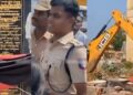 Assistant Superintendent of Police (ASP) Udhayakumar courageously removes the flagpoles from the highway