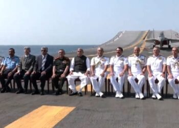 Defence Minister Rajnath Singh along with Naval officers onboard INS Vikramaditya