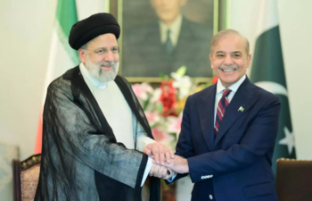 Left: Iran's President Ebrahim Raisi, Right: Pakistan PM Shahbaz Sharif