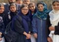 PDP Chief Mehbooba Mufti with school children during the electoral campaign