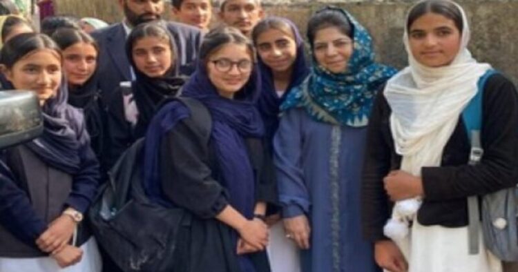 PDP Chief Mehbooba Mufti with school children during the electoral campaign
