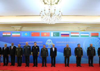 India's Defence Secretary Giridhar Aramane (Centre)