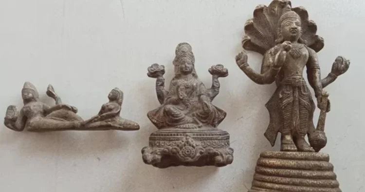 Three bronze statues, believed to be at least 400 years old, depicting Bhagwan Vishnu and Ma Lakshmi, were discovered during the excavation of a plot for a borewell installation in Baghanki village, Manesar (Source: HT)