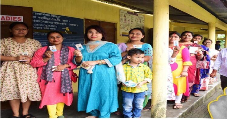 Voters standing in a queue to exercise their franchise