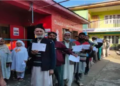 Voters standing in a queue to exercise their franchise